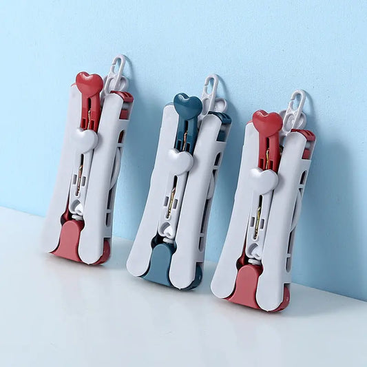Set 5 Appendini Pieghevoli da Viaggio – Grucce Portatili Salvaspazio in PP, Colori Blu o Rosso - N.1 Online